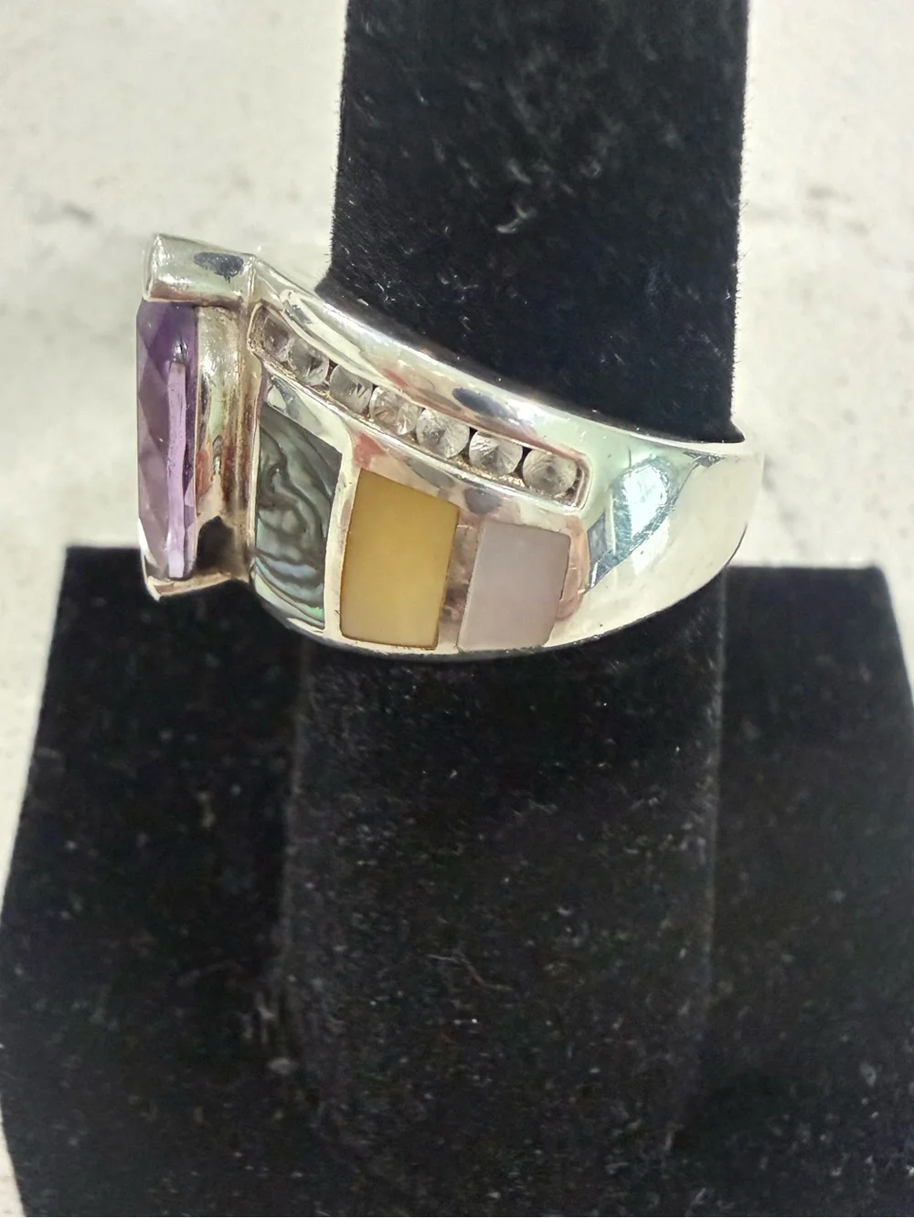 Sterling Silver Ring with Marquise Amethyst and white topaz gemstones on sides